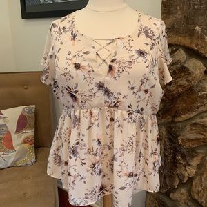 Torrid cream / floral shirt.